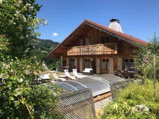 Appartement en chalet avec spa, sauna et piscine